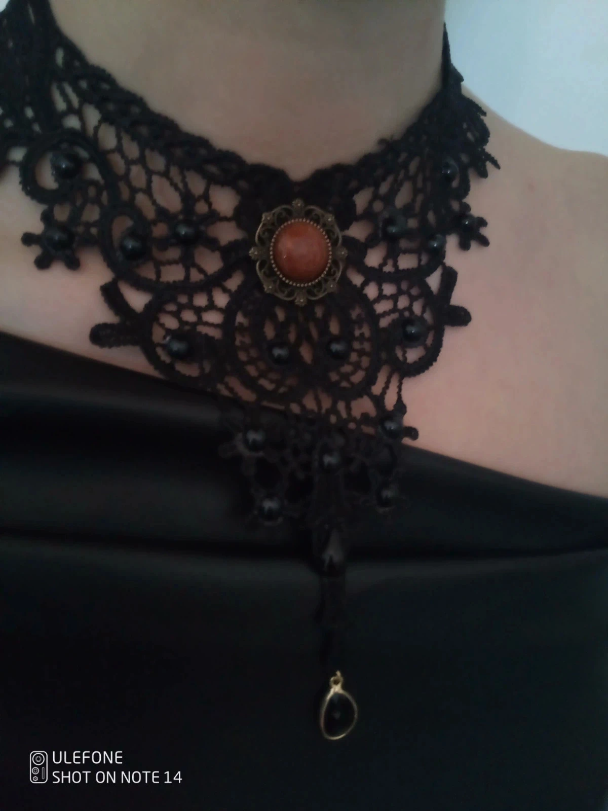 Zwarte macramekanten collier met zonnesteen en zwart onyx – photo 2